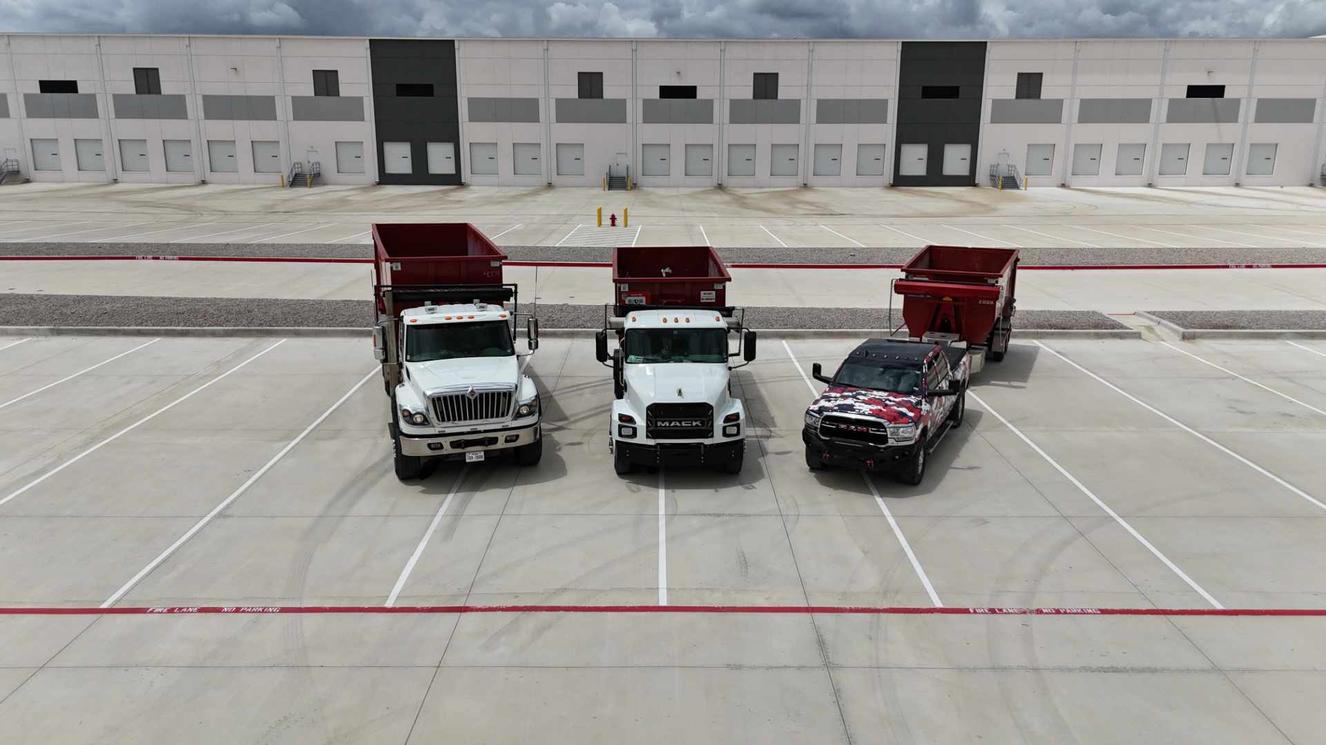 Roll-off dumpster trucks and trailer fleet – American AF Dumpsters