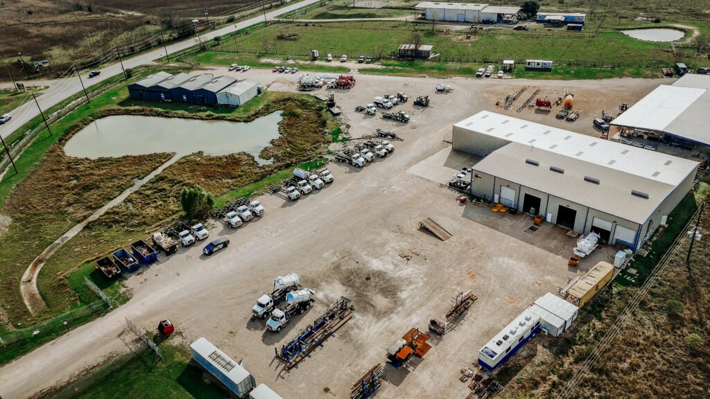 Heavy-duty rolloff trucks with Titan rolloff hoist and American tarp system